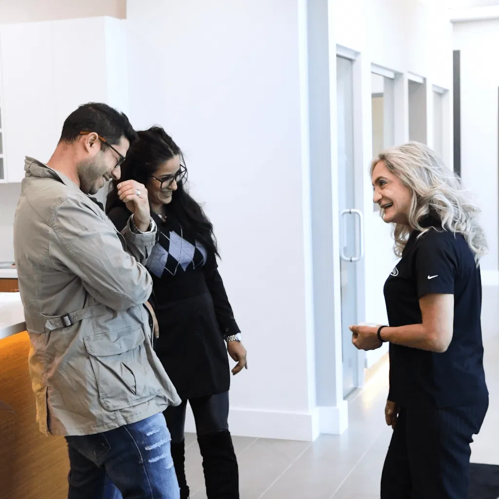 Japanese Auto Repair Customers Laughing