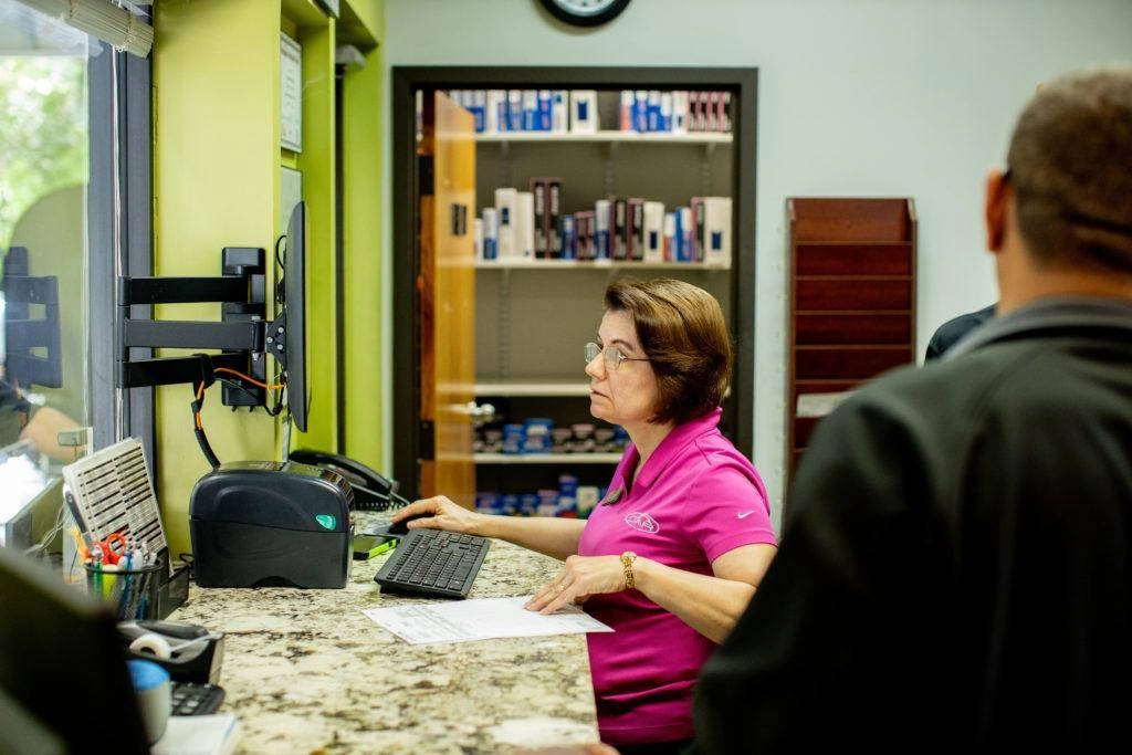 Assisting customers at the desk