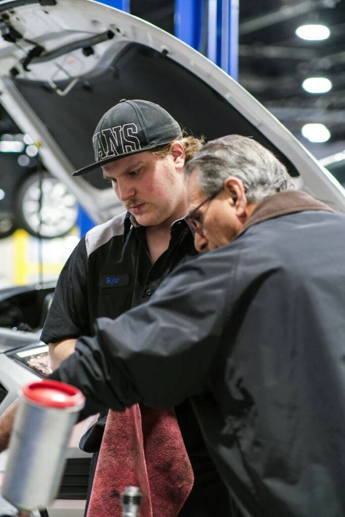 Mechanic Teamwork at Japanese Auto Repair