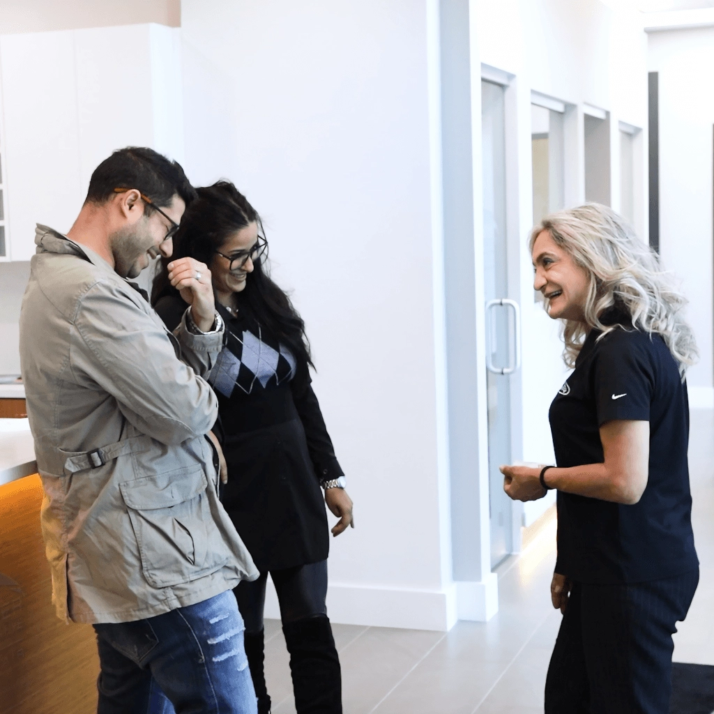 Japanese Auto Repair Customers Laughing