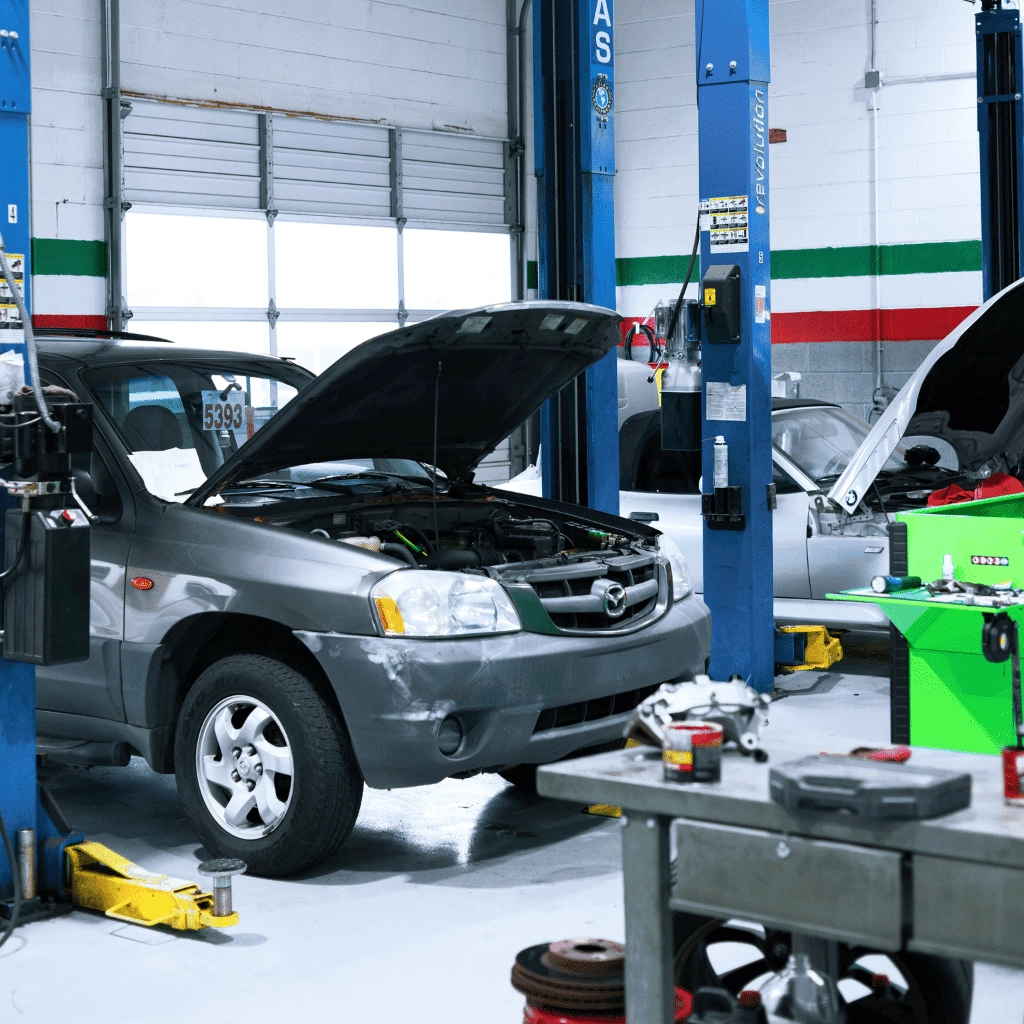 gray mazda vehicle getting serviced